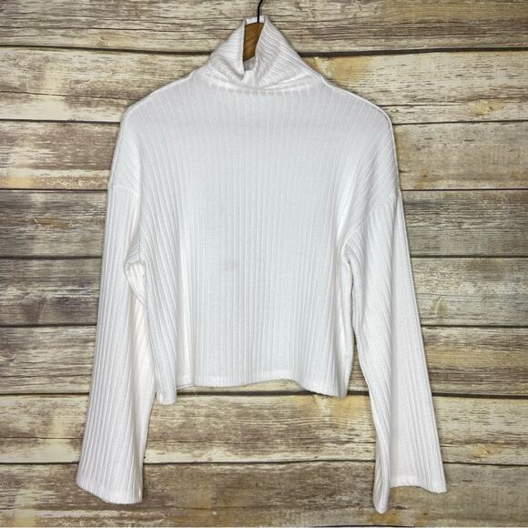 Enza Costa Tops - Enza Costa XS Off-white ribbed bell sleeve mock neck sweater